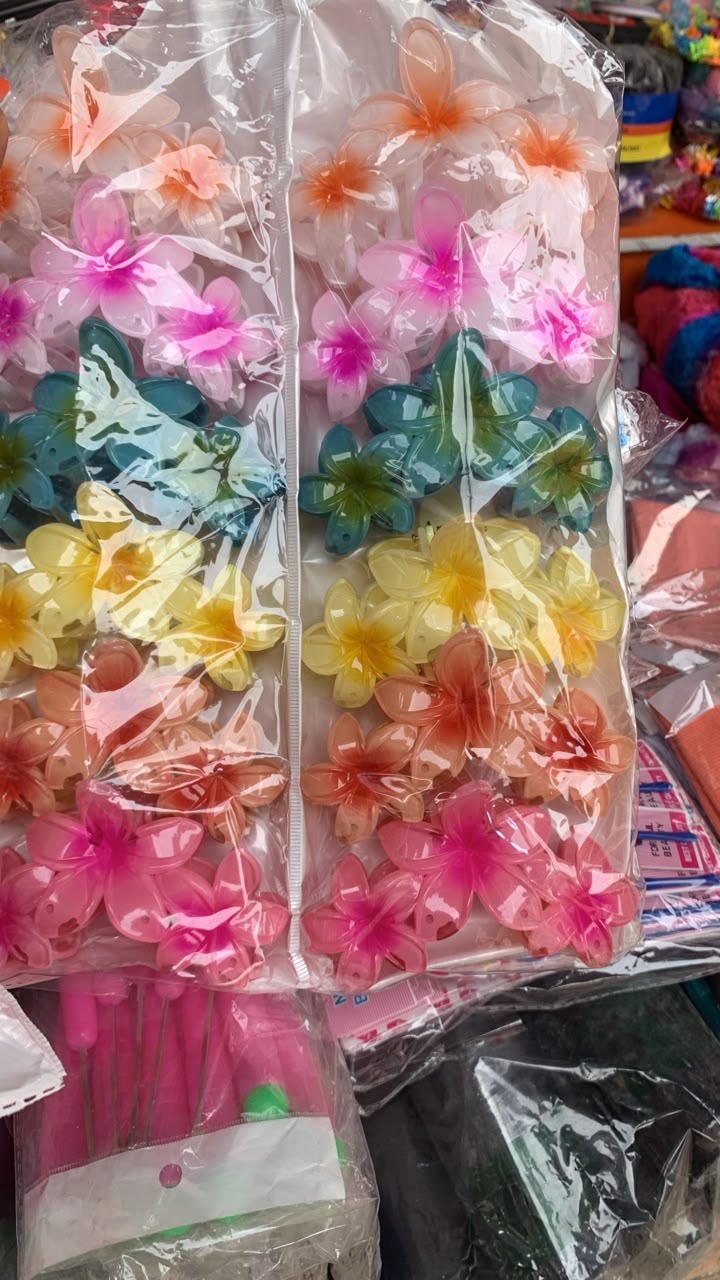 translucent plumeria flower hair claw clips