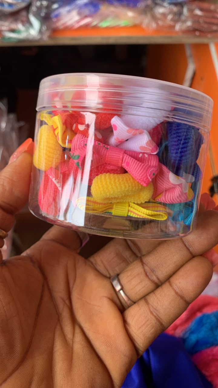 Hair ties and miniature fabric bows