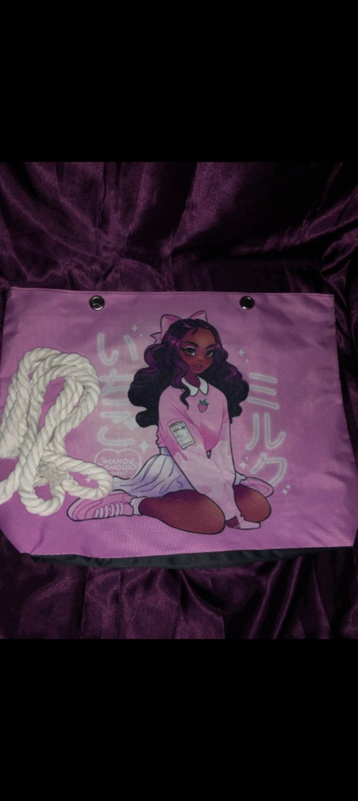 The Artistic Canvas Tote Collection ✨ — Soft Pink Canvas Tote with Kneeling Anime Character and Japanese Text - Features a soft pink background with a full-body illustration of a kneeling character in a pink sweater surrounded by glowing white Japanese script and star accents